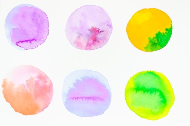 Row of hand painted watercolor circles for design isolated on white