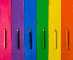 Free photo row of pencils and bright lgbt flag