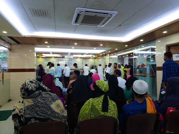 Row of people of various ages patient waiting for see doctor