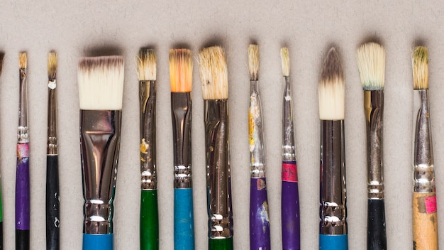 Row of profession paintbrushes
