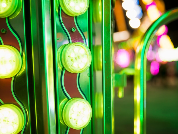 Rows of brightly colorful funfair lights