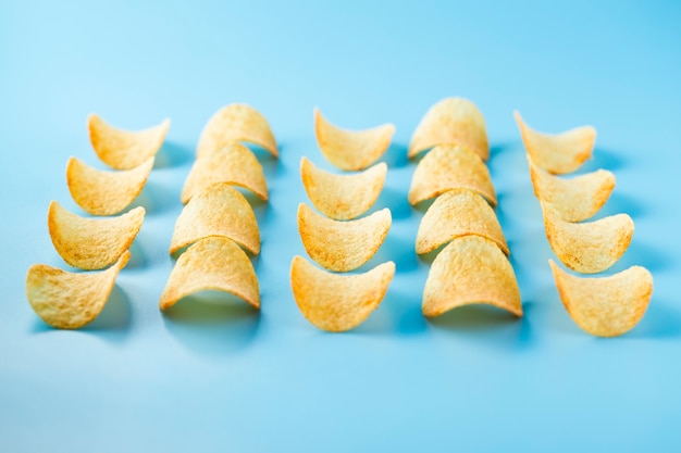 Rows and columns of chips with salt