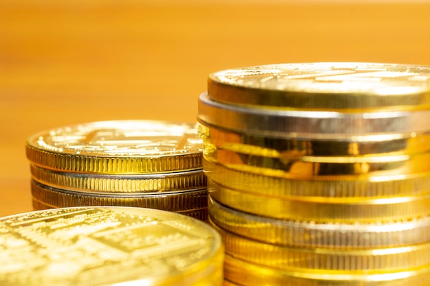 Rows, stacks of coins, selective focus of close up view and blank space