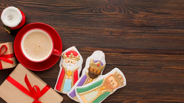 Royalty biscuit edible figurines on wooden background