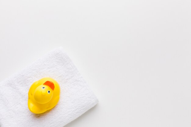 Rubber duck on towel copy space