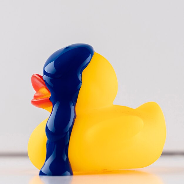 Rubber duck with blue paint dripping