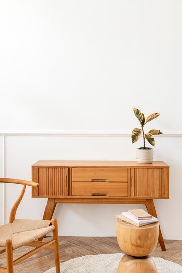 Example of a Japandi sitting room with wooden furniture and a potted plant