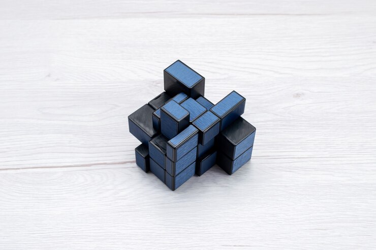 Free Photo rubisc cube isolated dark colored on light