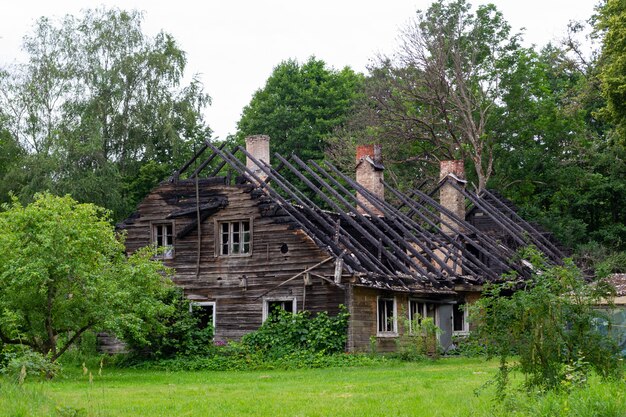 Premium Photo Ruins Of Old Wooden Burned Down House Building Without Roof Green Summer Garden Around