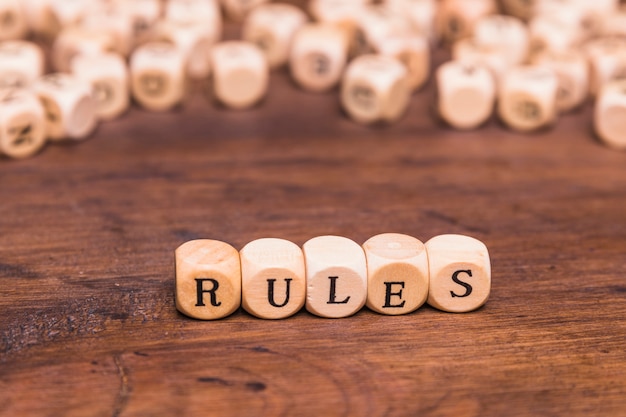 Rule word written on wooden cubes