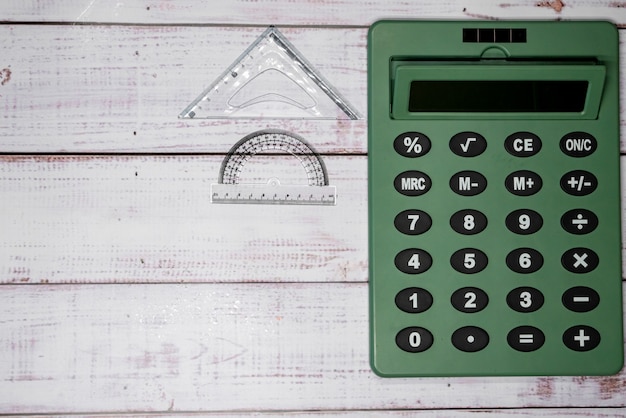 Rulers and calculator on boards