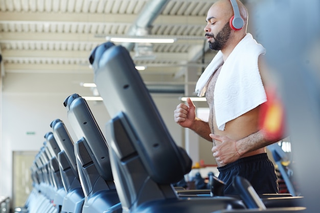 Free photo running training in gym