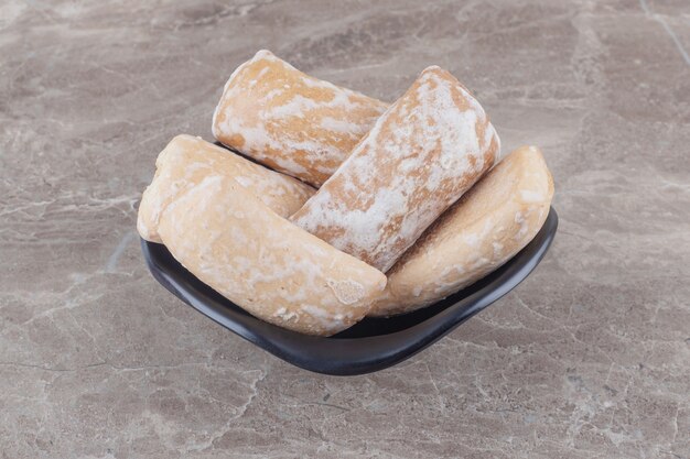 Russian cookies in a small bowl on marble 