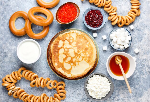 Russian pancake blini with sauces and ingredients