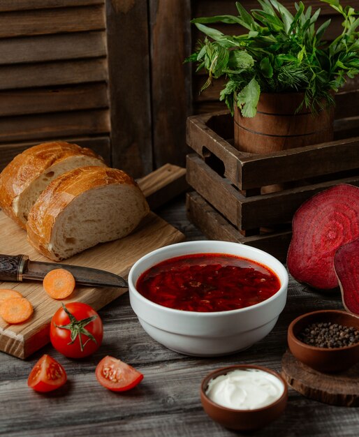 Russian soup borshch in white bowl