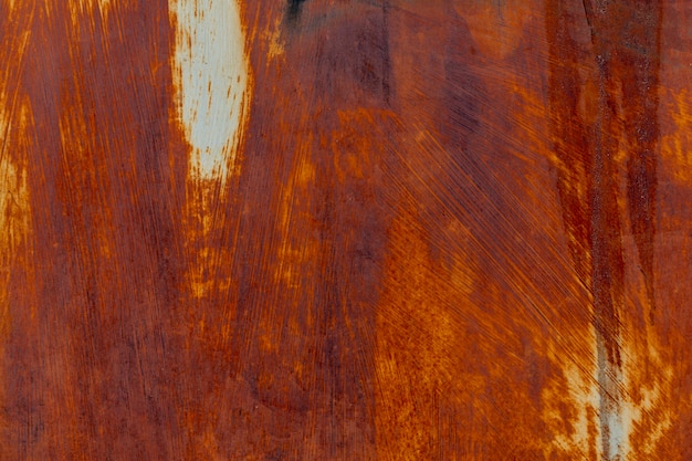 Rust on aged metallic surface