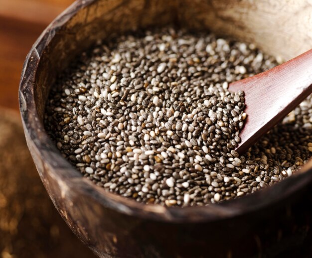 Rustic bowl and spoon with seeds