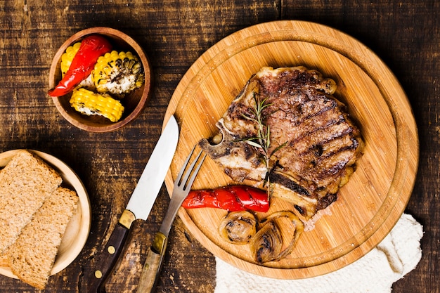 Rustic serving of dinner with beefsteak