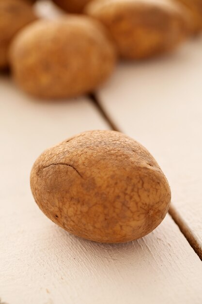 Rustic unpeeled potatoes on a table