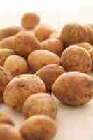 Free photo rustic unpeeled potatoes on a table