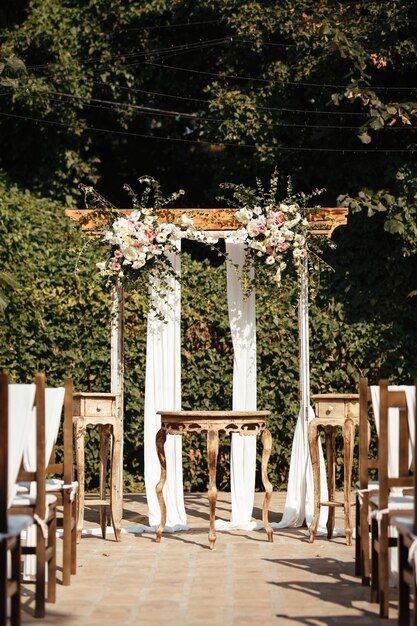 Rustic wedding aisle in a garden.