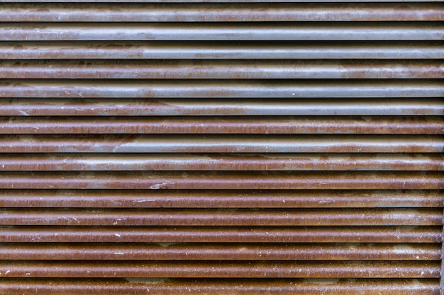 Rusty metallic surface with lines