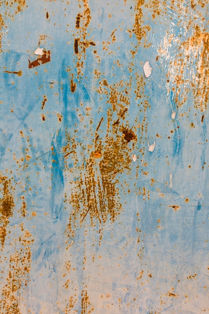 Бесплатное фото Ржавая окрашенная металлическая поверхность