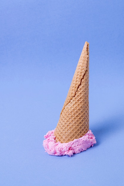 Sad image of fallen ice cream on cornetto