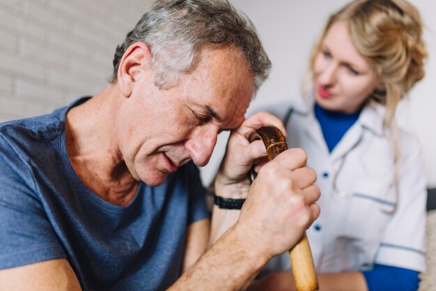 Sad man in nursing home