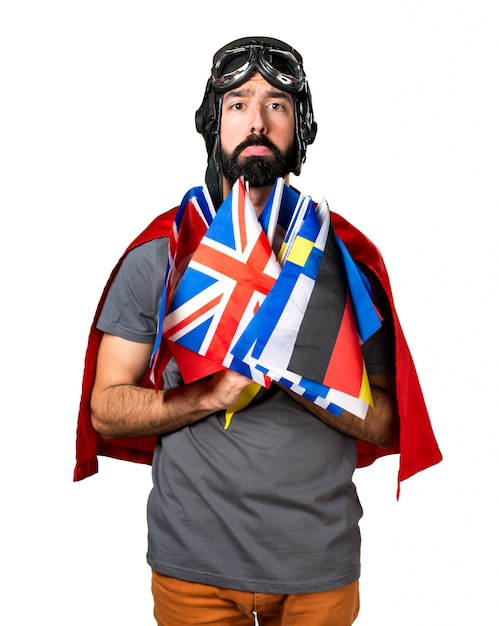 Sad superhero with a lot of flags