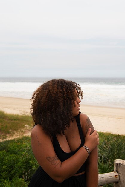 Sad woman near sea