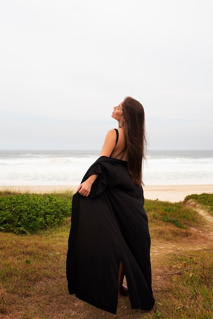 Sad woman near sea