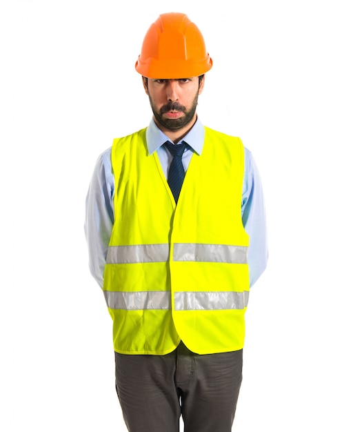 Free photo sad worker over white background