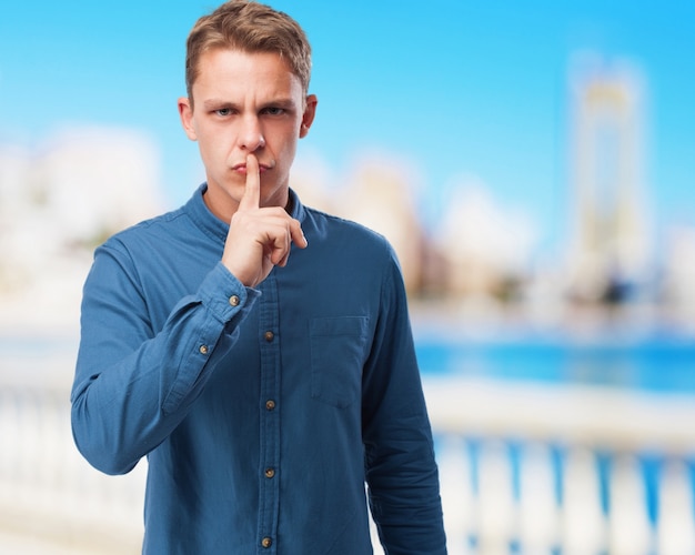 Free photo sad young-man silence sign