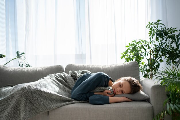 Sad young woman at home