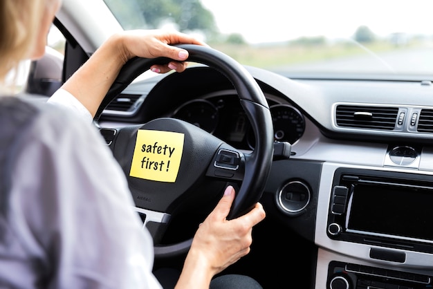 Safety first sign on car wheel