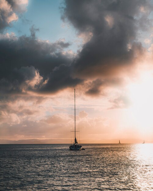 Sailboat under a pastel sky