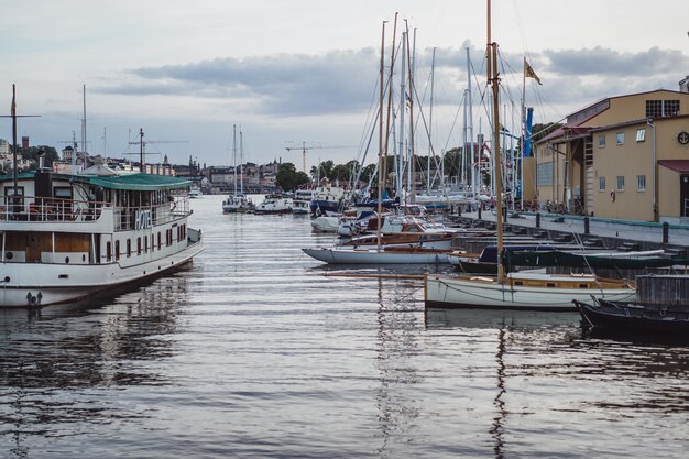 sailing boats and yachts on the pier in Stockholm front of the city center