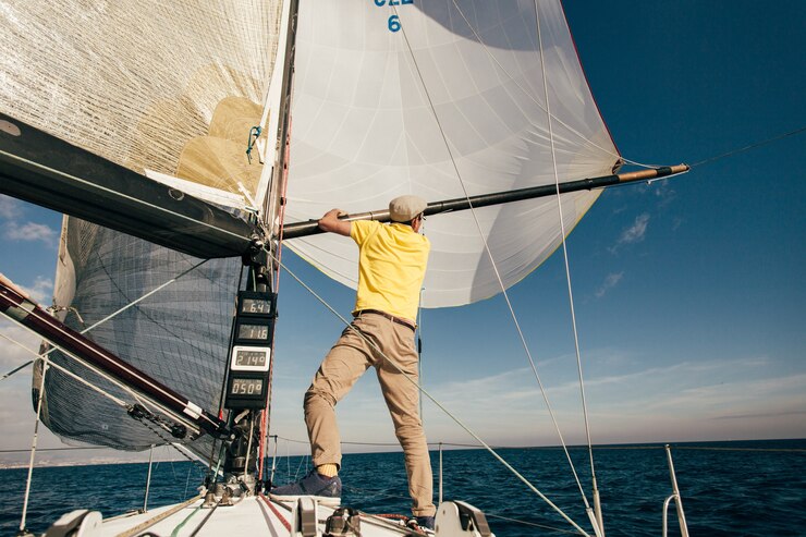 Free Photo sailor services private yacht in marina