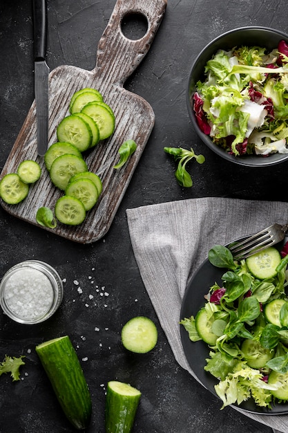 Salad arrangement with dark tableware