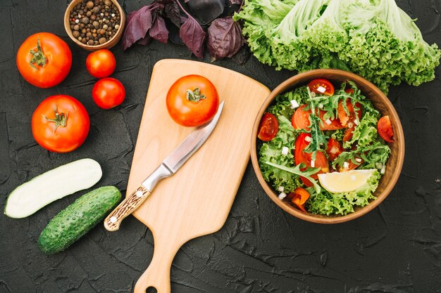Salad and cutting board