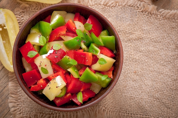 Salad of sweet colorful peppers with olive oil