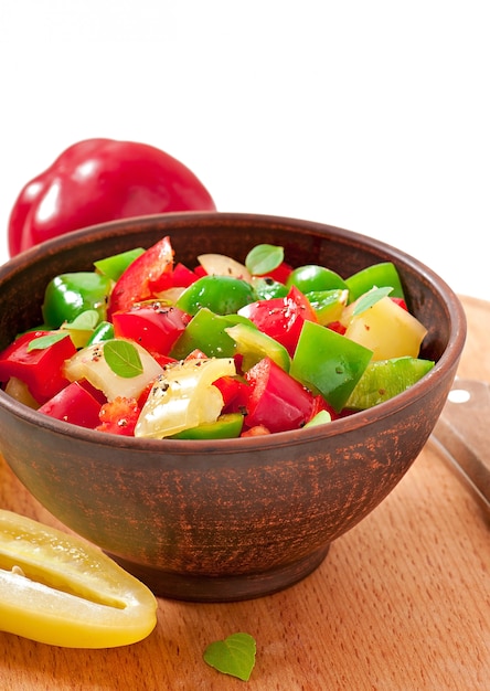 Salad of sweet colorful peppers with olive oil