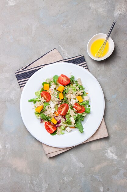 Salad on a white plate seen from above