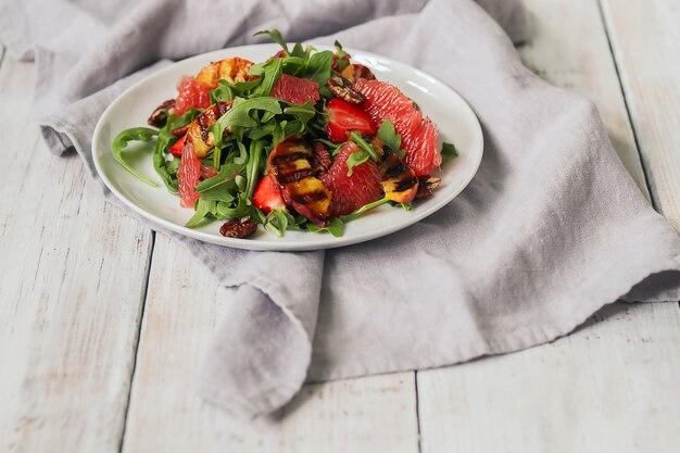 Salad on white table