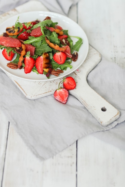 Salad on white table