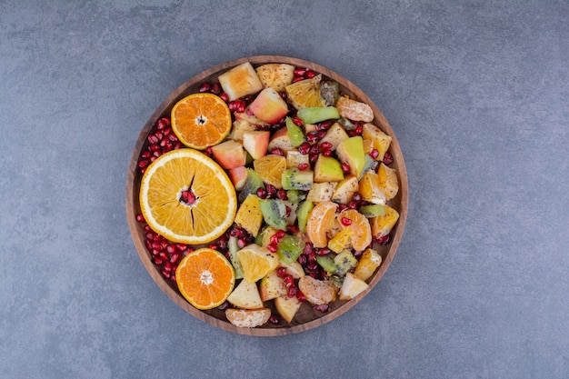Salad with chopped fruits, herbs and spices