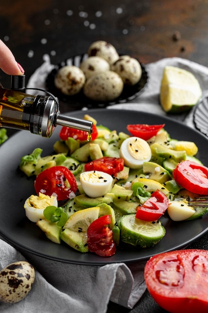 Salad with dark tableware close-up