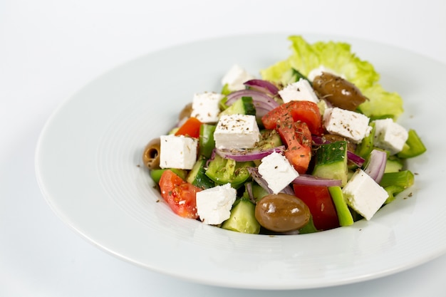 Free photo salad with feta cheese olives and fresh vegetables