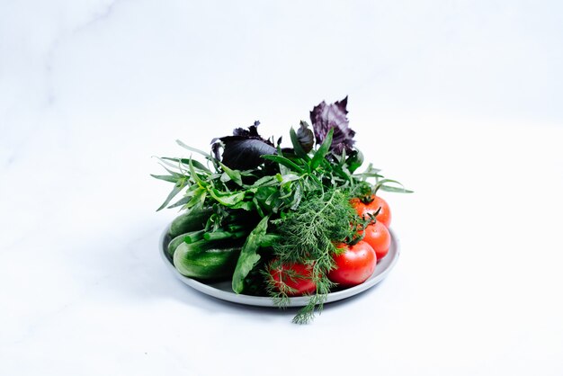 Salad with fresh vegetables and herbs